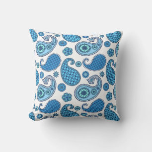 Paisley pattern, shades of blue on white cushion