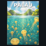 Palau Jellyfish Lake Travel Magnet<br><div class="desc">The Palau Jellyfish Lake, tucked away on Eil Malk Island in the Rock Islands Southern Lagoon, is a sun-dappled oasis of primal wonder. Surrounded by lush, calcareous cliffs and emerald-green foliage, the lake’s surface glistens like a molten jewel against the broad Pacific sky. Sunlight filters through narrow stone chasms, illuminating...</div>