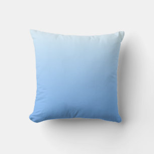 Pale blue ombre background cushion