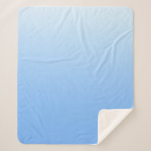 Pale blue ombre background sherpa blanket