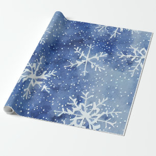 Pale blue sky with giant snowflakes wrapping paper