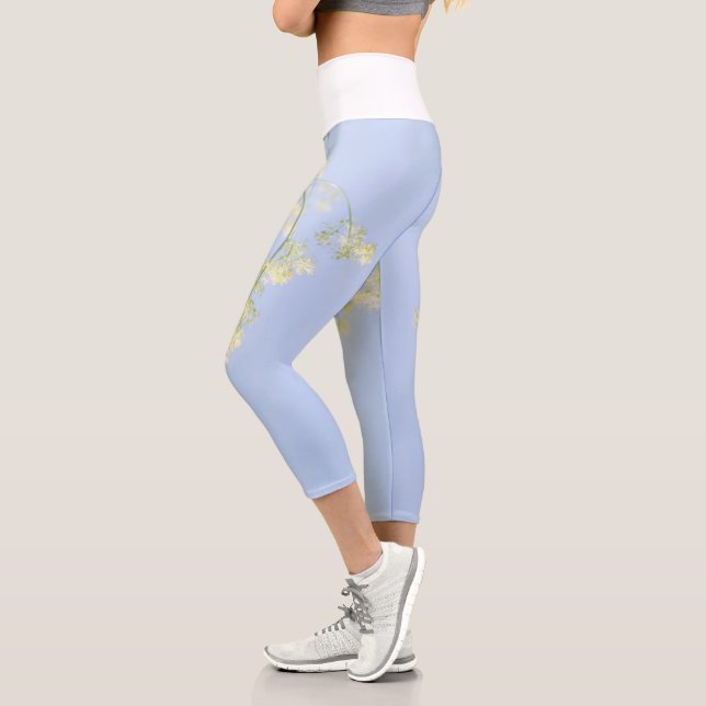 Pale Pastel Blue Sky Wild Flowers Meadow Capri Leggings (Left)