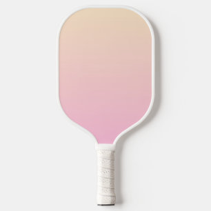 Pale pink and yellow gradient background pickleball paddle