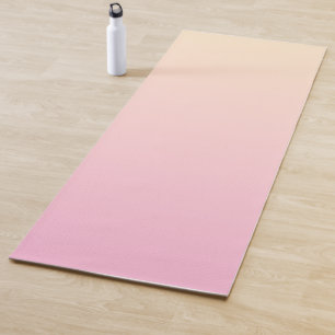 Pale pink and yellow gradient background yoga mat