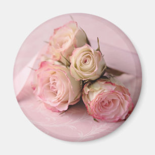 pale roses on pink swirls magnet
