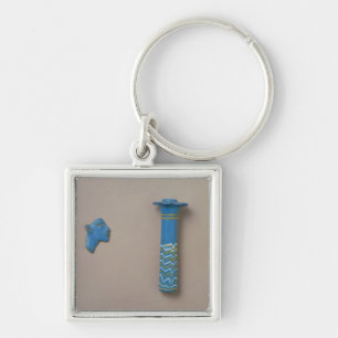Palm column kohl flask and fragment of inlay key ring