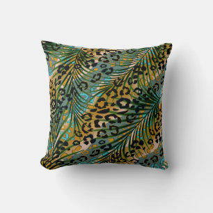 Palm leaves on a leopard background. cushion