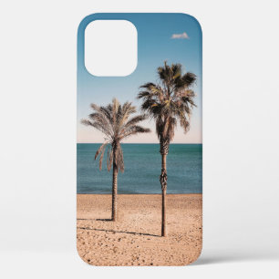 Palm tree on beach shore in the morning iPhone 12 case