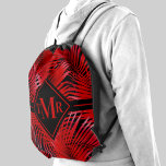 Palm Tree Pattern Red Black Monogram Drawstring Bag<br><div class="desc">Red tropical palm fronds on a black background ready for your monogram in chic lettering on the front in any color (can be deleted or moved on the layout.) Create for yourself or give as a gift.</div>