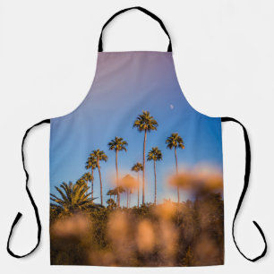 Palm tree under blue sky apron
