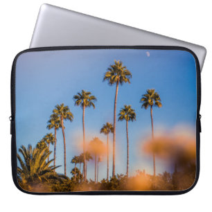 Palm tree under blue sky laptop sleeve
