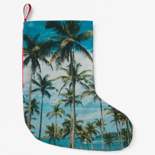 Palm trees above the ocean, vintage toned and retr small christmas stocking