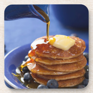 Pancakes with syrup and blueberry coaster