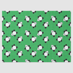 Panda bear laying on grass tissue paper