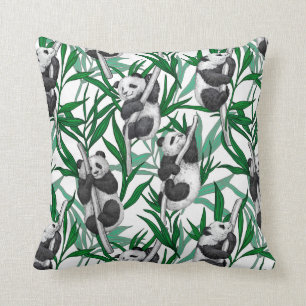 Panda cubs on cushion