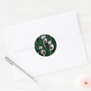 Panda cubs on dark green classic round sticker