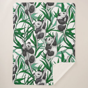 Panda cubs on sherpa blanket