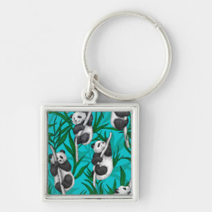 Panda cubs on turquoise key ring