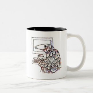 Pangolin on a computer Two-Tone coffee mug