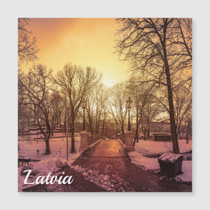 Panoramic view of snowy park during sunset in Riga
