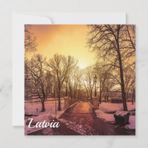 Panoramic view of snowy park during sunset in Riga