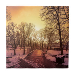 Panoramic view of snowy park during sunset in Riga Ceramic Tile