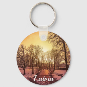 Panoramic view of snowy park during sunset in Riga Key Ring