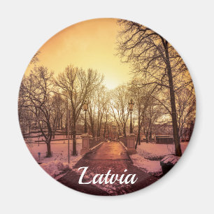Panoramic view of snowy park during sunset in Riga Magnet