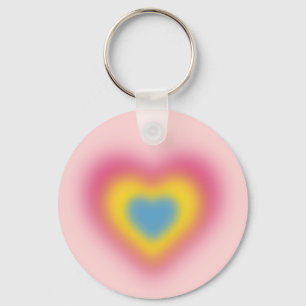 Pansexual flag colours on blurred heart key ring