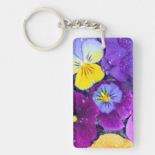 Pansy flowers floating in bird bath with dew 2 key ring