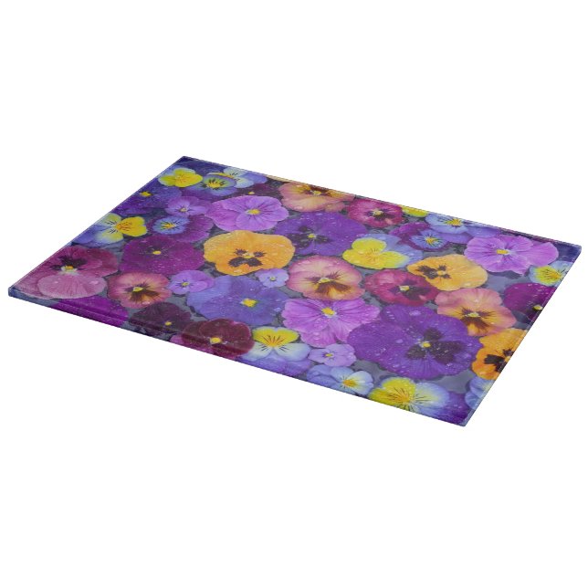 Pansy flowers floating in bird bath with dew cutting board (Corner)
