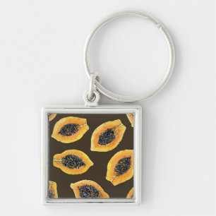 Papaya slices on dark brown key ring
