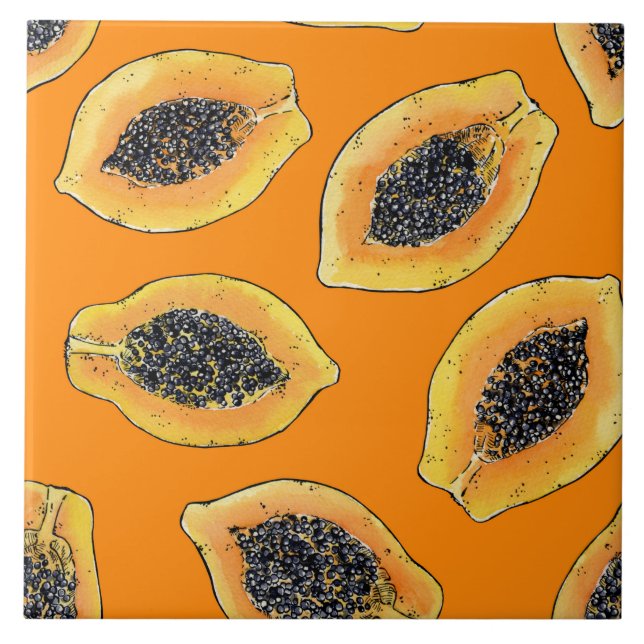 Papaya slices on orange ceramic tile (Front)
