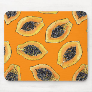 Papaya slices on orange mouse pad