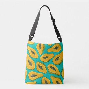 Papaya slices on turquoise crossbody bag