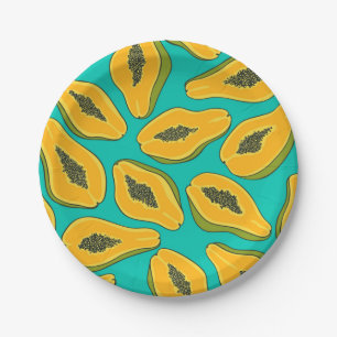 Papaya slices on turquoise paper plate