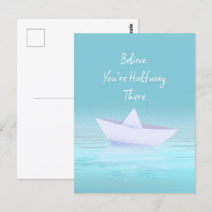 Paper boat on blue ocean  postcard