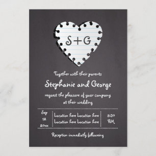 Paper heart on chalkboard with monogram wedding invitation