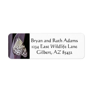 Paper kite butterfly on purple return address label