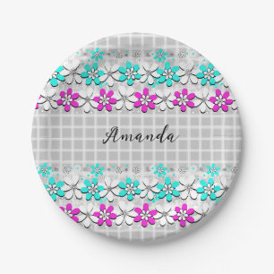 Paper neon flowers on a grey-white chequered plate