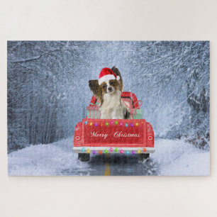 Papillon Dog in Snow sitting in Christmas Truck  Jigsaw Puzzle