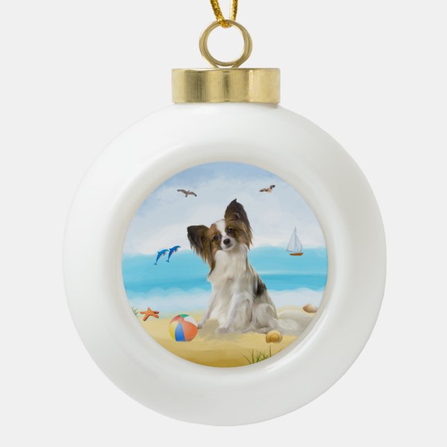 papillon Dog on Beach  Ceramic Ball Christmas Ornament (Front)