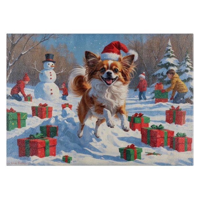 Papillon Dog Running in Snow with Christmas Hat Cutting Board (Front)