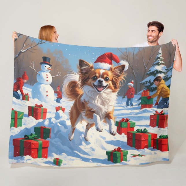 Papillon Dog Running in Snow with Christmas Hat Fleece Blanket (In Situ)