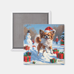 Papillon Dog Running in Snow with Christmas Hat Magnet
