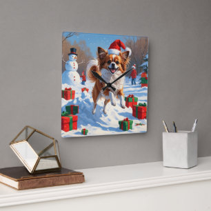 Papillon Dog Running in Snow with Christmas Hat Square Wall Clock