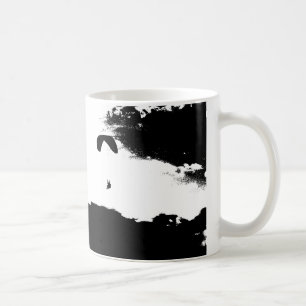Paragliding above the clouds coffee mug