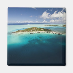 Parasailing over the beautiful lagoon of Bora Magnet
