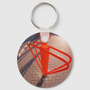 Parking for bicycles in the street closeup key ring