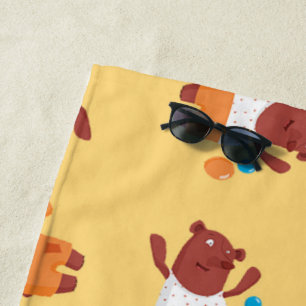 Party brown bear on orange beach towel